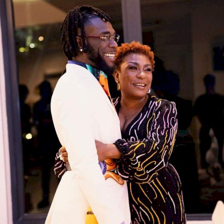 'You've lost weight' - Burna Boy's mother says as she carries Odugwu on her back on his 30th birthday (Video)