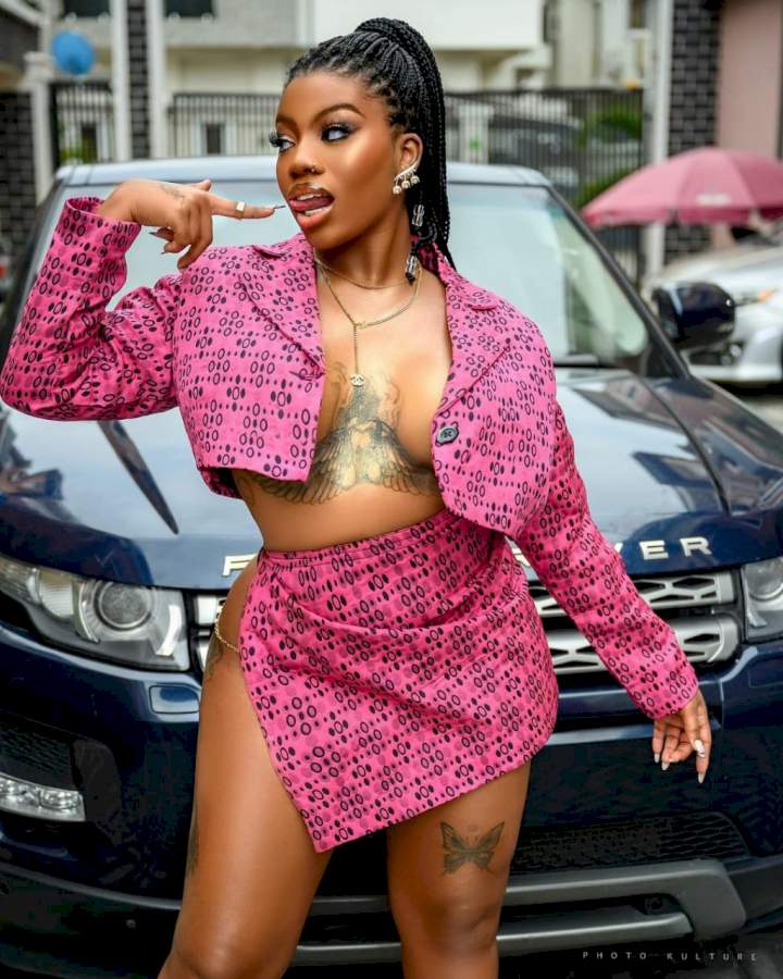 BBNaija's Angel unbuttons shirt to showoff her cleavage in racy photos