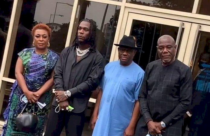 “Very irresponsible” – Gov. Wike dragged for giving Burna Boy land, money and N10M each to artistes