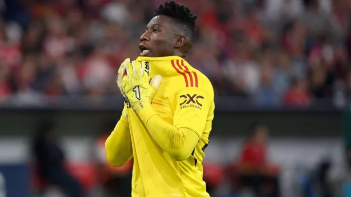 Andre Onana dejected after conceding in Bayern va Man United -- Image credit: Imago