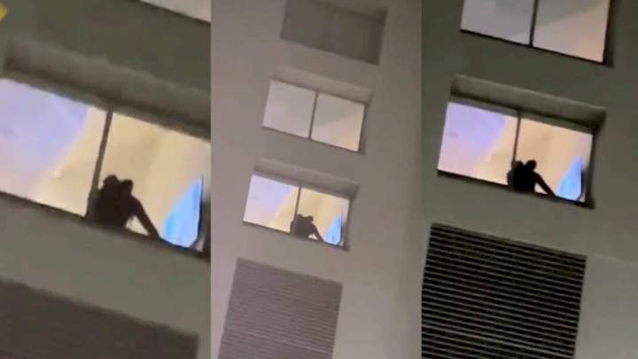 Couple gleefully have s3x by their window side as passersby watch (video)