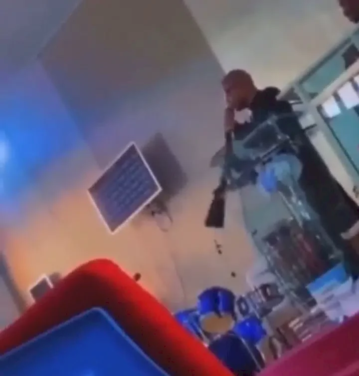 'He will show up with a bomb tomorrow' - Reactions as Nigerian pastor shows up in church with a gun (Video)