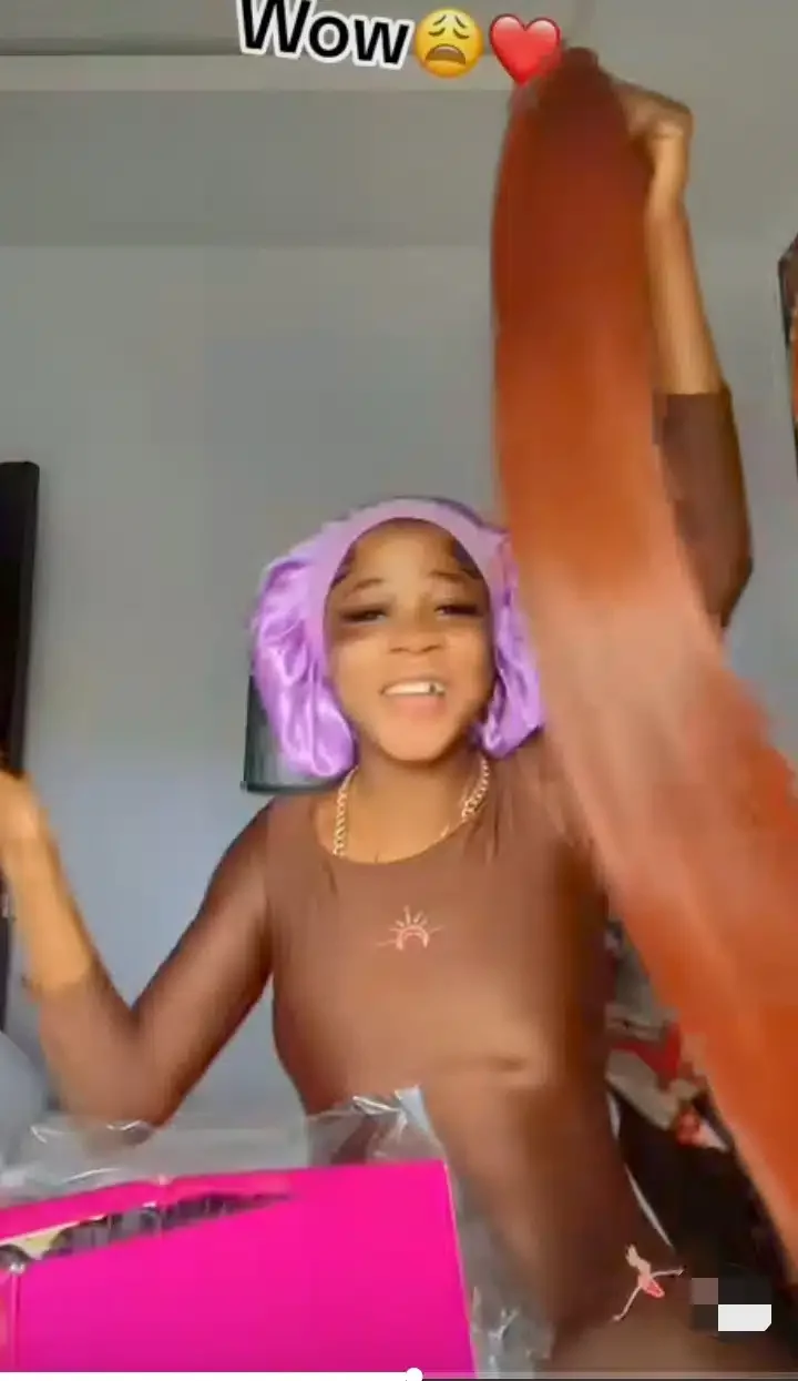 'One blow, one bone straight' - Reactions as lady with black eye flaunts expensive wig she received from boyfriend (Video)