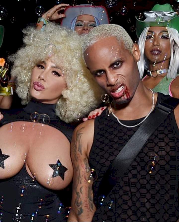 Amber Rose's b**bs hang out of her interesting Halloween costume