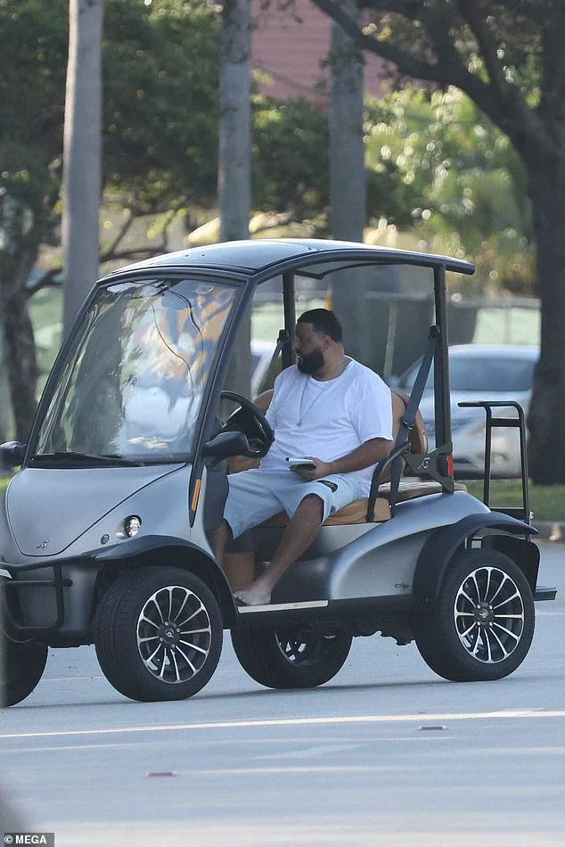 DJ Khaled is pulled over by police in Miami while riding in his golf cart barefoot and handling his phone (Photos)