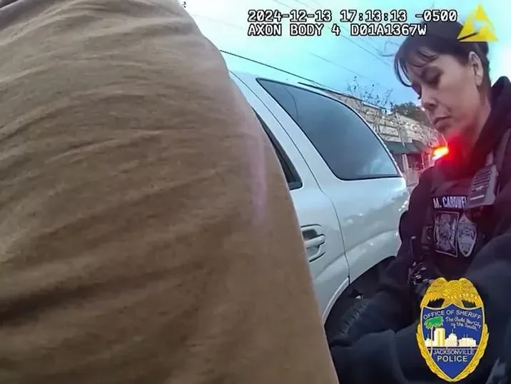 Officer Cardwell accidentally pulled the trigger after she struggled to remove the pistol from it's holster