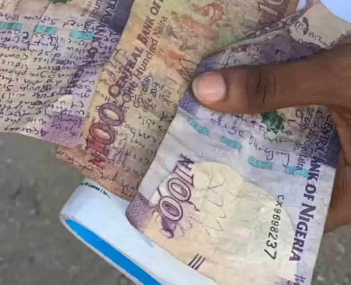 'They call me shalipCOPY' - Student afraid of carry-over inscribes details on arm, ₦100 naira notes to cheat in exams