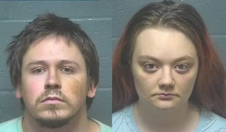 Couple arrested after police found their two young children's bodies and faces covered in dried faeces