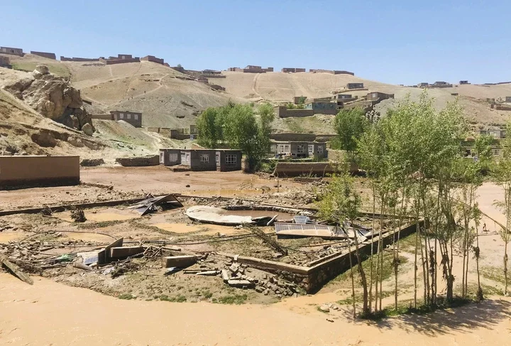 Damaged houses are seen after heavy flooding in Ghor province in western Afghanistan Saturday, 18 May 2024