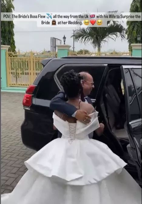 Nigerian lady gets emotional after her boss flew to Nigeria from UK for her wedding ceremony