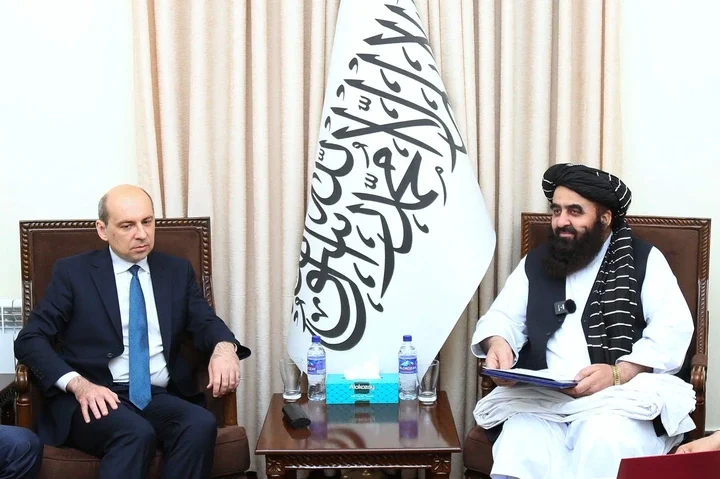 Amir Khan Muttaqi meets with Russia's ambassador to Afghanistan Dmitry Zhirnov at the foreign ministry in Kabul