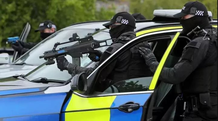 Army put on standby as UK police hand in weapons