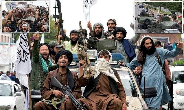 Jubilant Taliban fighters celebrate outside abandoned US embassy and declare a national holiday on one year anniversary of US military leaving Afghanistan (videos)