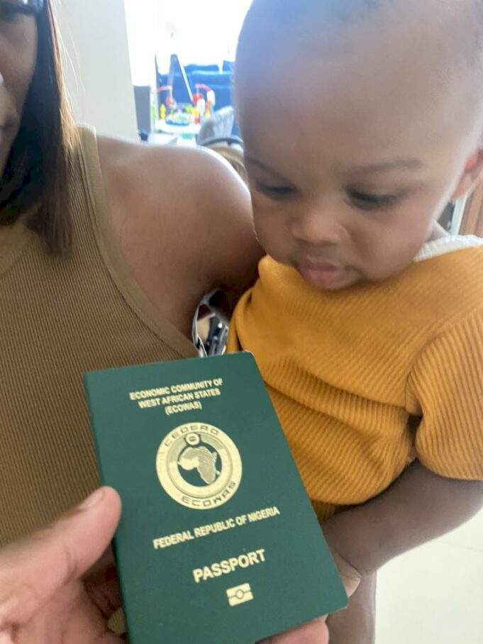 'He doesn't look impressed' - Fans react as Mike Edwards gives his British born son a Nigerian passport