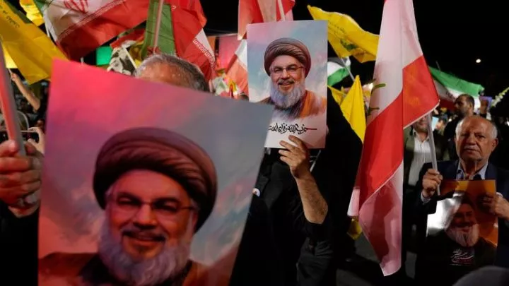 Iranian demonstrators hold posters of slain Hezbollah leader Hassan Nasrallah during an anti-Israeli protest after his death. Pic: AP