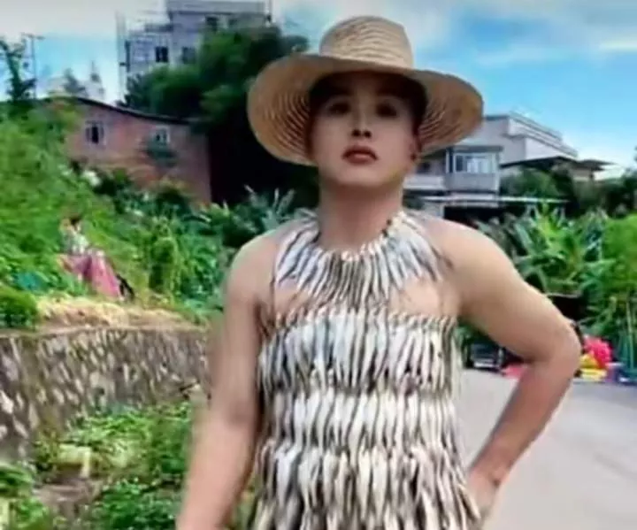 Woman goes viral for outfit made entirely of raw fish