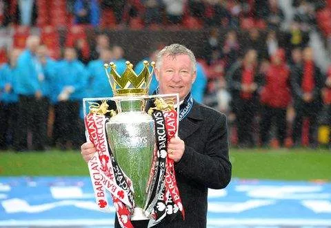 ManU manager Sir Alex Ferguson celebrates with the Barclays Premier League trophy, after the game