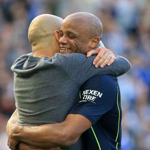 Pep Guardiola and Vincent Kompany in a warm embrace - Imago