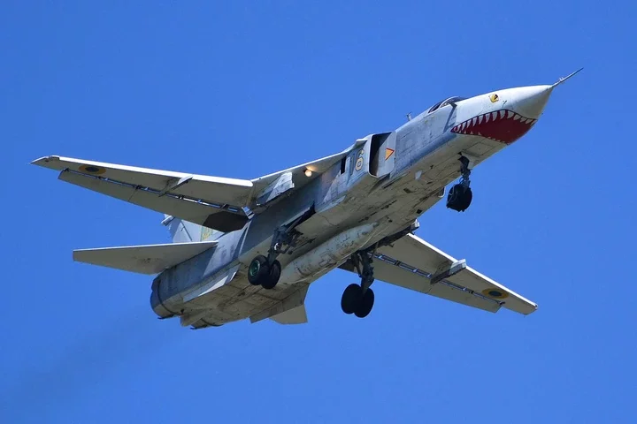 A Ukraine Air Force Su-24 Flying in the sky.