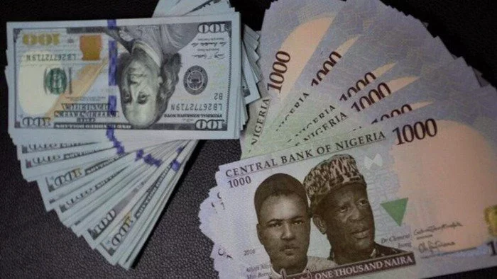 Naira again falls to record as dollar sales decline further