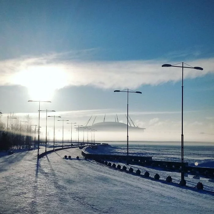 A Sports Stadium Way Off In The Distance On A Foggy Morning Looks Like Some Sort Of Massive UFO Or Alien Space Craft