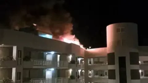 Amanda Kay The roof of the hotel on fire