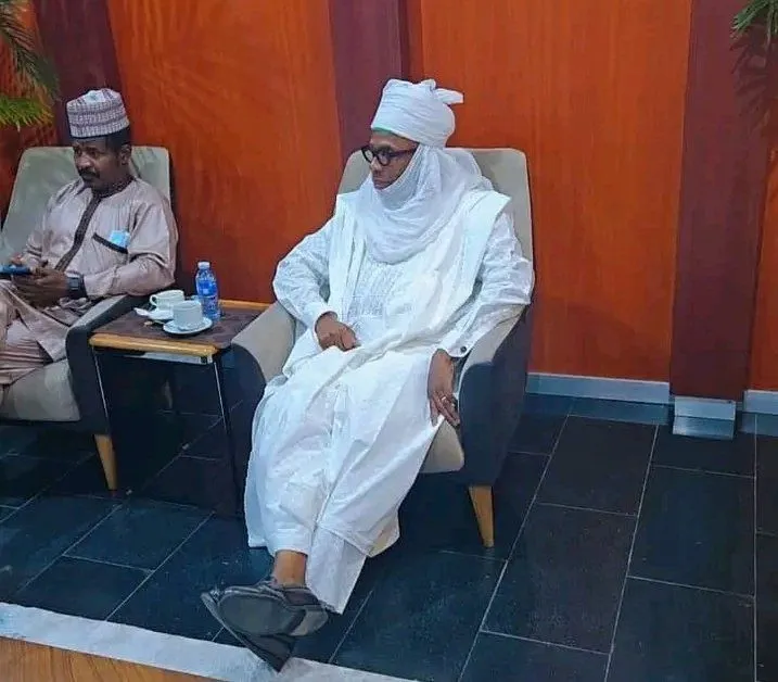 Former Minister of Transport, Rotimi Amaechi, adorns Northern attire to Buhari
