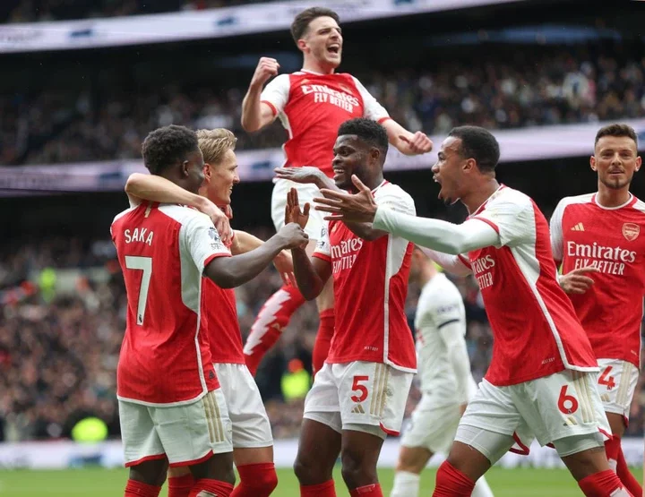 Arsenal celebrate their first goal, an own goal by Tottenham Hotspur's Pierre-Emile Hojbjerg during the Premier League match between Tottenham Hots...