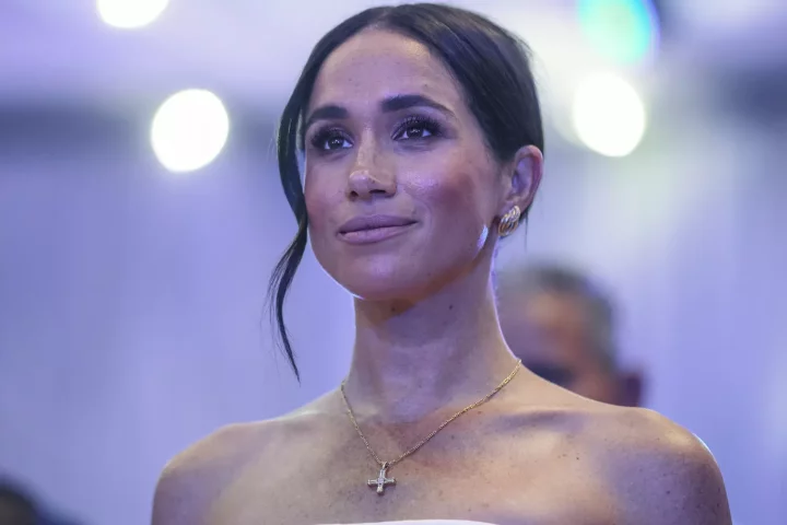 Britain's Meghan, Duchess of Sussex, looks on as she attends a Sit Out with Britain's Prince Harry (unseen), Duke of Sussex, at the Nigerian Defence Headquarters in Abuja on May 11, 2024 as they visit Nigeria as part of celebrations of Invictus Games anniversary. (