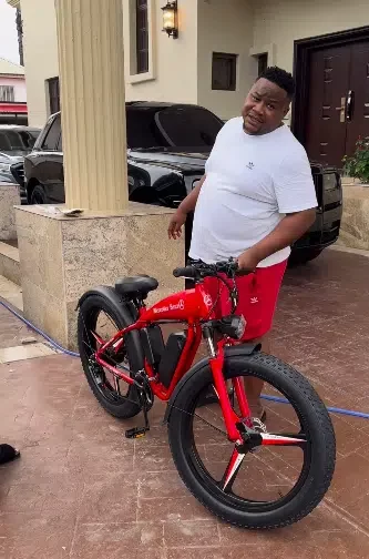 Cubana Chief Priest dumps Rolls-Royce for a bicycle to get fit