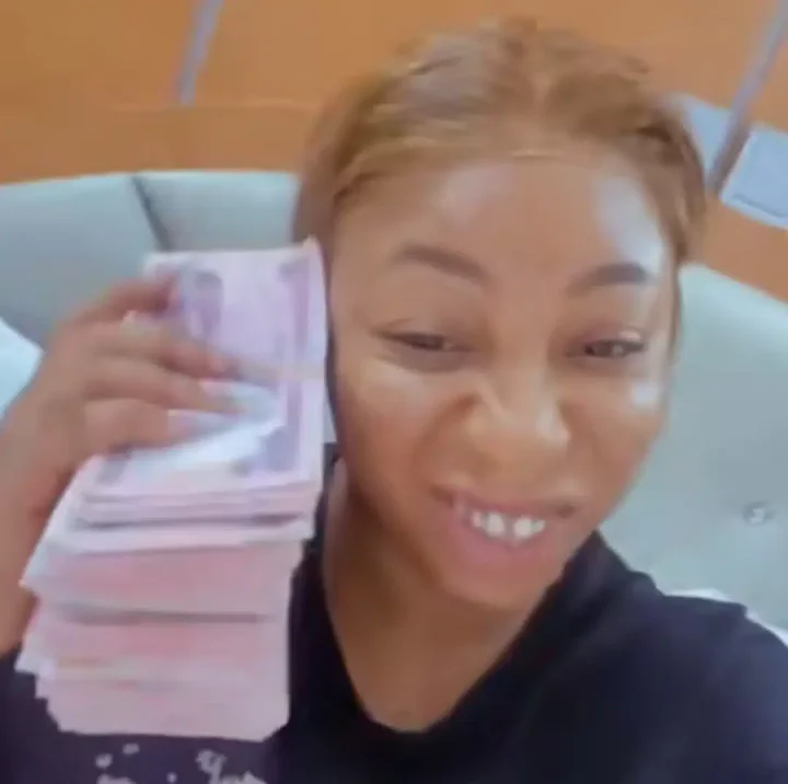 'I can't wait' - Couple sets TikTok on fire, shows off bundles of ₦1,000, ₦500, ₦200, and ₦50 sprayed on their wedding night