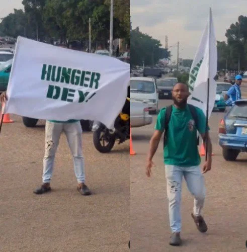 'Hungry dey, We must protest!- Nigerian man chants as he protests alone on the streets of Abuja