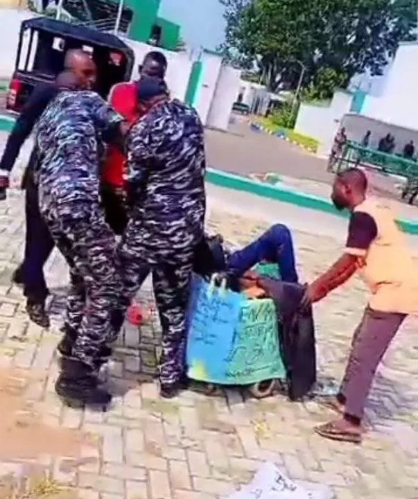 #EndBadGovernanceInNigeria: Police Officers Seen Brutalizing Protester On Wheelchair In Bauchi (Video)