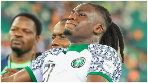 Calvin Bassey celebrates a famous win for Nigeria Super Eagles.