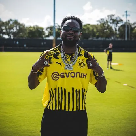 Nigerian Afrobeats star Patoranking teams up with Karim Adeyemi and Borussia Dortmund teammates at 2025 FIFA Club World Cup.