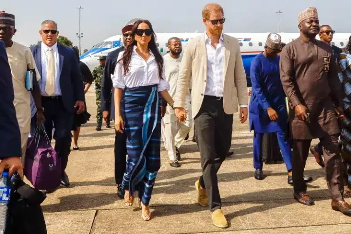 Meghan Markle ties aso oke wrapper as she arrives Lagos with Prince Harry on day 3 of their visit