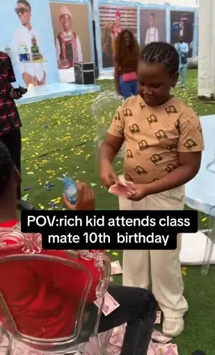 'I will never be poor in this life' - Mixed reactions as rich kid makes it rain money on classmate on his 10th birthday