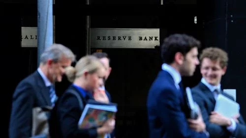 People walk past the Reserve Bank of Australia in Martin Place, Sydney.