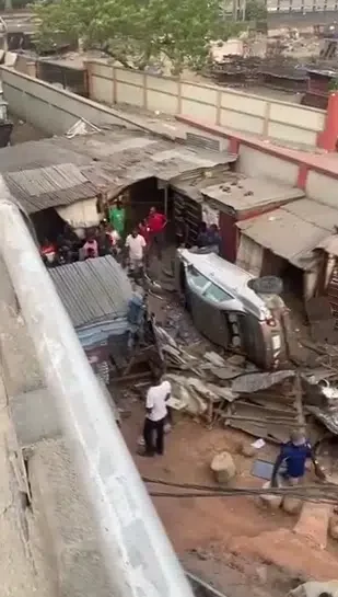 Moment car falls off bridge in Lagos