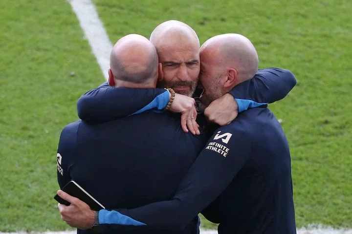 Enzo Maresca celebrates with his backroom staff