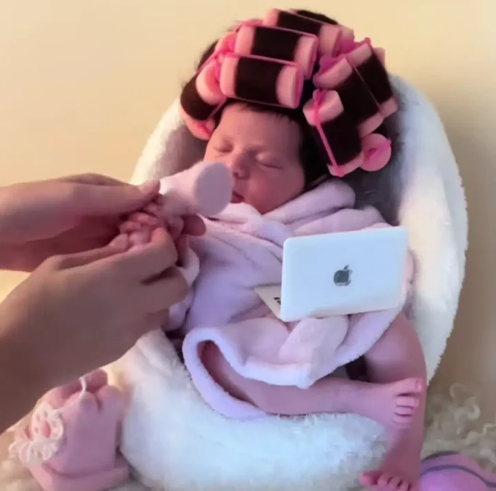 'She's all about self care and soft life' - Little baby charms social media users with adorable poses in a photoshoot