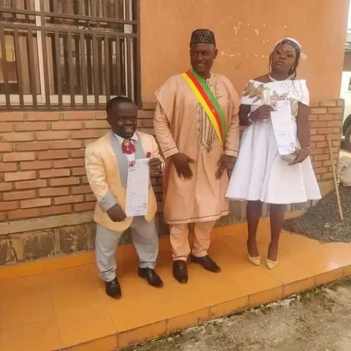 Diminutive teacher weds heartthrob