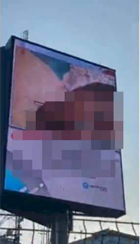 Man arrested for allegedly streaming explicit content on a billboard in Port-Harcourt (Photos)