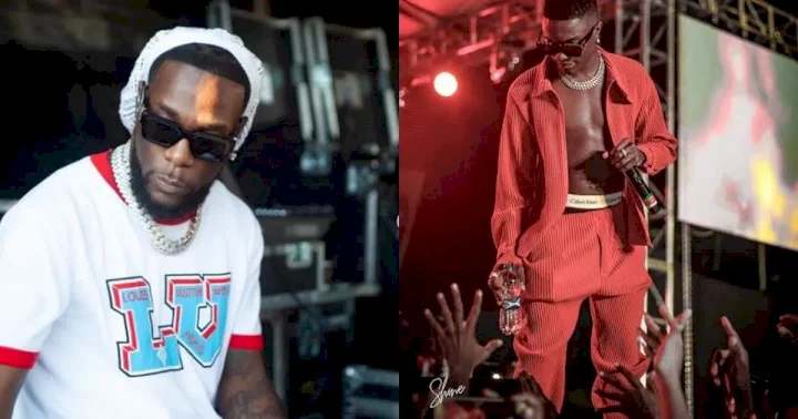 Burna Boy ruthlessly lashes out at Wizkid FC, citing false claims made against him by the fan base