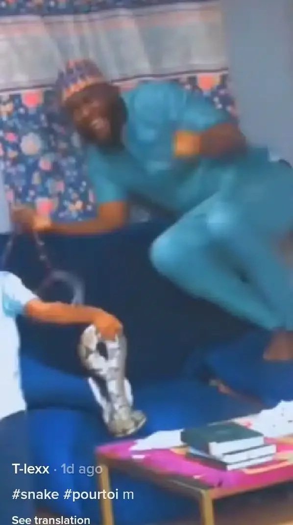 Man cries like baby as his little son approaches him with snake in hand,  Video causes buzz
