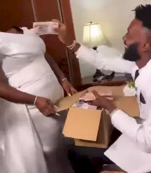 Bride raises the bar, presents hubby with box full of cash (Video)