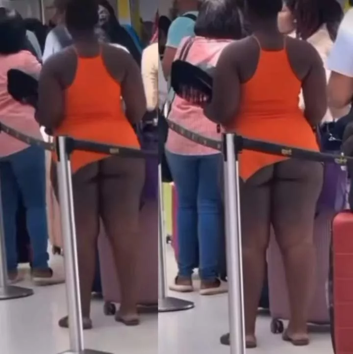 Half-naked woman seen waiting in line at Florida airport (video)