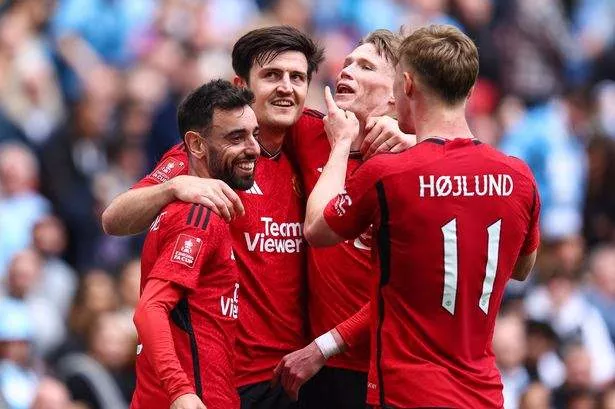 Harry Maguire of Manchester United celebrates scoring their 2nd goal with teammates Bruno Fernandes, Scott McTominay and Rasmus Hojlund during the Emirates FA Cup Semi Final match between Coventry City and Manchester United at Wembley Stadium on April 21, 2024