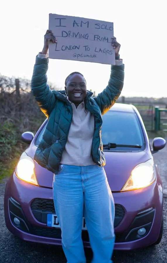 Female Solo Driver, Pelumi Nubi Arrives In Nigeria After Road Trip From London To Lagos, Receives Heroic Welcome (Video)