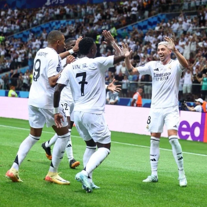 Federico Valverde reacts after Vinicius Junior cut him off from a group photo with his teammate.